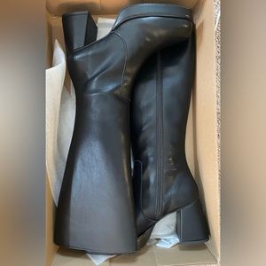 Tall black boots. Never worn! Urban outfitters